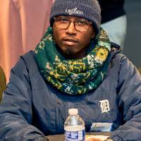 International Anchor Allies Winter 2026 First Mixer - a student poses for picture while seated